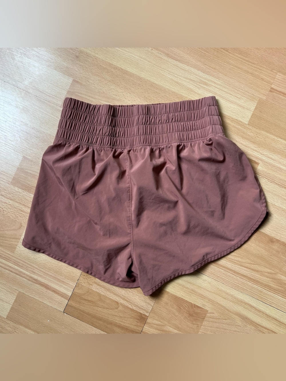 GAP High-Waist lined Smocked Athletic Shorts in dusty mauve neutral